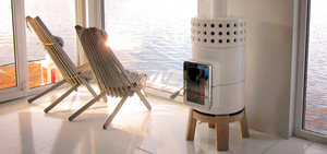 White Stack Stove in bright window lined room along the water